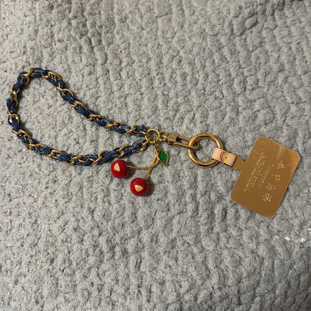 Louis Vuitton:  LV x TM Denim Cerise phone holder - Picture 2 of 11